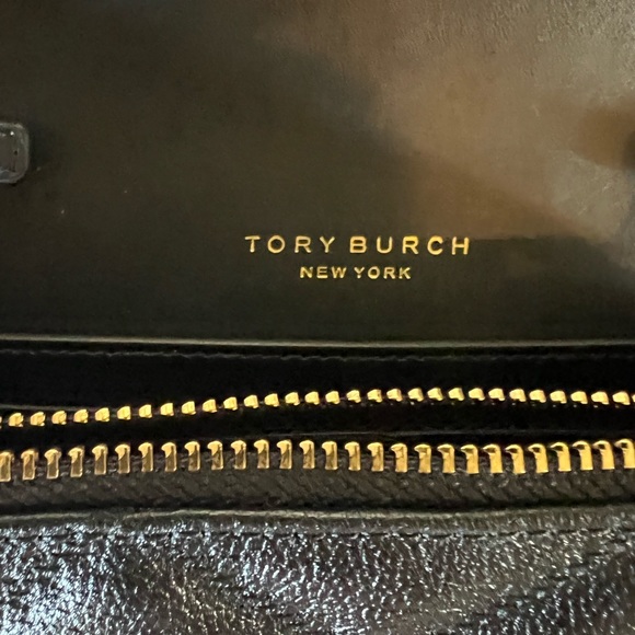 Tort Burch quilted black crossbody with gold detail. - Picture 7 of 9